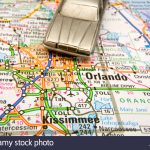 Model Sedan On A Road Map Of Orlando And Kissimmee Fl Stock Photo   Road Map To Orlando Florida
